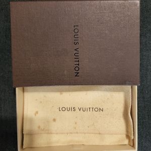 Mini Louis Vuitton pull box with dustbag